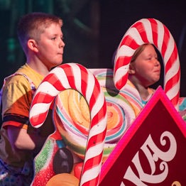 child actors with candy sticks